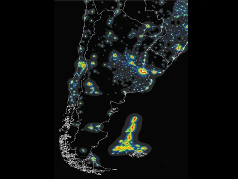 Argentina in a dark map. There are some colour spots marking the light pollution